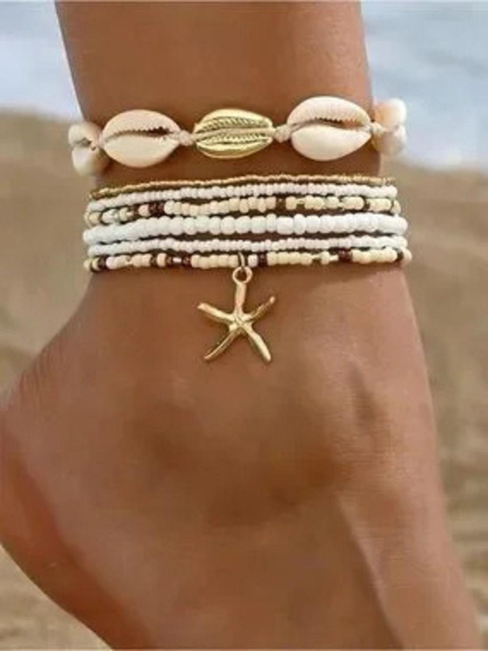 Anthropologie White & Gold Multi-Layer Shell Bracelet with Starfish Charm